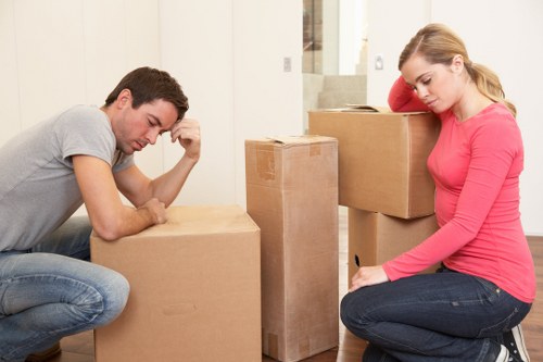 Packed moving boxes and furniture ready for removals in Arkley